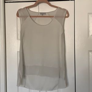 Off white sleeveless blouse